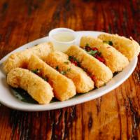 Yuca Fritas (GF) · Fried yuca. Comes with mojo sauce. Contains soy. We cannot make substitutions.
