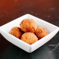 Mac Bites (V) by Cheesie's · By Cheesie's. Homemade mac and cheese formed into balls, breaded, and fried crispy. Served w...