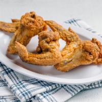 Wings by Chicago's Home of Chicken and Waffles · By Chicago's Home of Chicken and Waffles. 3 fried chicken wings. Contains gluten, soy, and n...