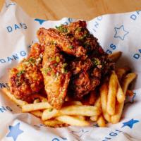 Caramelized Fish Sauce Wings (GF) with Fries by Dang Good Wings All Day · By Dang Good Wings All Day. 6 jumbo wings with Chef Thai's famous caramelized fish sauce, sc...