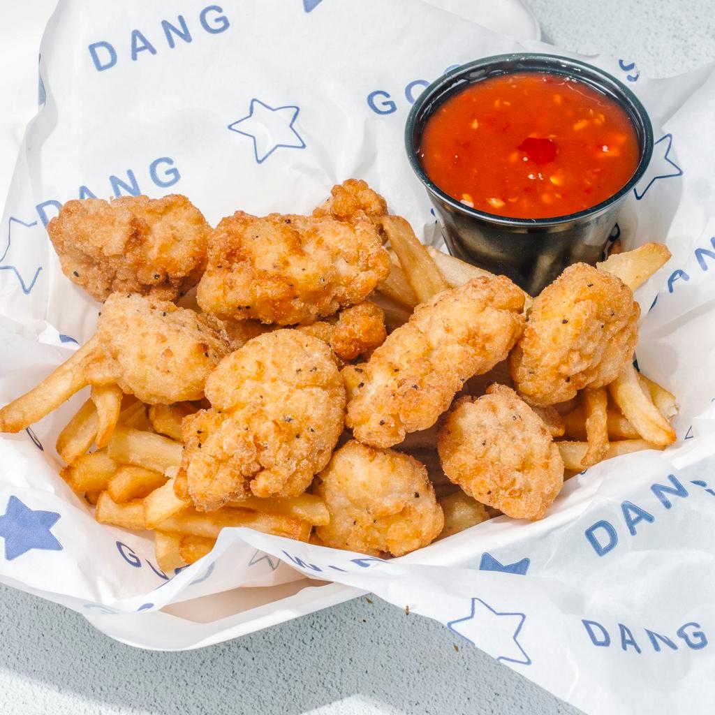 Boneless GF Nuggets by Dang Good Wings All Day · By Dang Good Wings All Day. 6 gluten-free nuggets with choice of sauce. Served with side of fries. Our nuggets are dredged in rice flour and fried to golden brown. Contains peanuts, dairy, soy, nightshades. and  eggs. We cannot make substitutions.