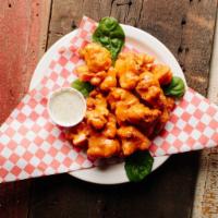 Cauliflower Wings (VG) · Hand-breaded, fried cauliflower. Served with buffalo sauce and creamy dill ranch. 100% vegan...