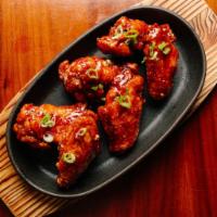 Guava BBQ Wings · 6 wings. Guava, vinegar, soy sauce. A sweet bbq sauce with a tropical taste. Contains sesame...