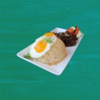 Tapsilog · Marinated beef, garlic rice, fried egg and a side of tomato and cucumber. 