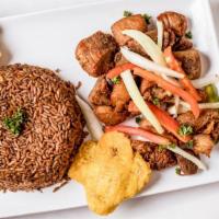 Griot Complete (Fried Pork) · Marinated fried Pork served with rice, plantains & salad