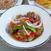 Queue Boeuf · Stew Oxtail served with rice, plantains & salad