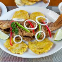 Pwasson (Whole Snapper) · Whole snapper fried, grilled, garlic butter or Creole sauce. Served with plantains and choic...