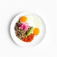 Southwest Quinoa Breakfast Bowl · Southwest quinoa, corn succotash, over-easy cage free eggs, avocado crema, pickled onion, re...