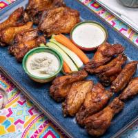 16 Pcs  All Natural Wings · All natural (no hormones or antibiotics)  chicken wings cooked to perfection. Choose your fa...