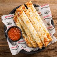 Cheesy Breadsticks · Topped with garlic butter and mozzarella cheese and served with a side of marinara.