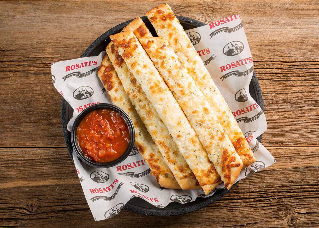 Cheesy Bread Stix · Breadsticks topped with garlic butter and mozzarella cheese and served with a side of marinara.