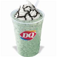 The Mint Chip Royal™ Shake · Cool mint and chocolaty bits blended with milk, and creamy DQ® vanilla soft serve into a DQ®...