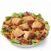 Rotisserie-style Chicken Bites Salad Bowl · DQ's new 100% white meat, juicy tender, rotisserie-style chicken bites, served on top of a c...