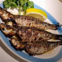 Sardeles - Appetizer · Fresh sardines - appetizer size -chargrilled with olive oil, lemon, oregano, and a pinch of ...