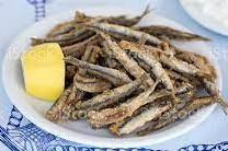 Fried Gavros · Fresh Mediterranean Gavros fish from Greece fried with salt & pepper and lemon.  Please note: this item is NOT gluten-free.