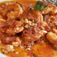 Garides Saganaki · Greek style shrimp sauteed with tomatoes, peppers, onions and feta cheese