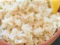 Rizi · Seasoned rice with Greek olive oil