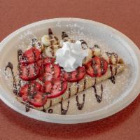 Monkey Business Crepe · Nutella, banana, strawberry and chocolate drizzle.