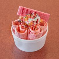 4. Tooty-Fruity Ice Cream Roll · Strawberry base, fruity pebbles, strawberry wafer and raspberry drizzle.