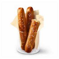 Dairy Queen Bakes! Pretzel Sticks with Zesty Queso · Soft pretzel sticks, served hot from the oven, topped with salt and served with warm zesty q...