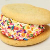 Butter Sugar Cookie with Strawberry Ice Cream Sandwich · With very berry strawberry ice cream.