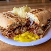 Mama's Stromboli Madness · Stacked spicy Italian sausage with slivered onions, mozzarella cheese and marinara sauce on ...