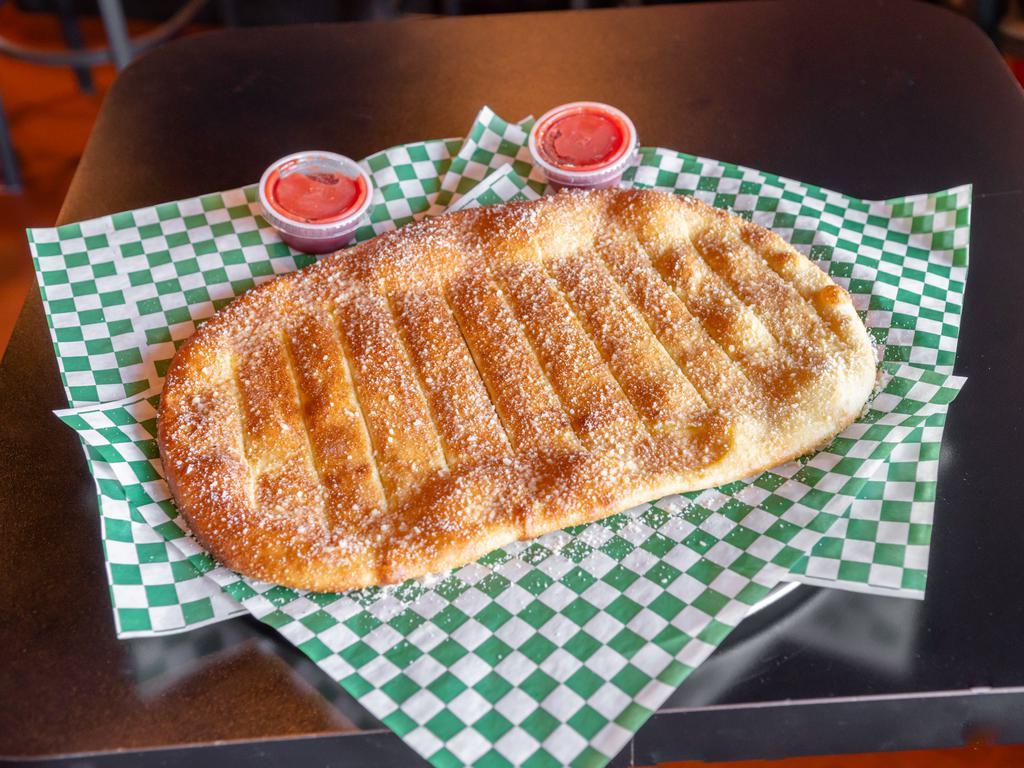 Garlic Bread Stix · Oven baked bread topped with garlic butter and Parmesan cheese.