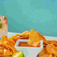 Chips & Salsa · House-made corn chips dusted with tajín, served with house-made salsa.