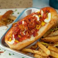 Sonoran Hotdog · Noble Bread bun, all-beef hot dog, topped with diced onion, tomato, mustard, crispy bacon.