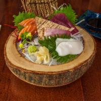Sashimi Sampler · Chef's choice of sashimi. 8 pieces.