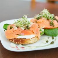 Bagel with Lox · cream cheese, spinach, tomatoes, onions, smoked salmon, capers, sprouts.