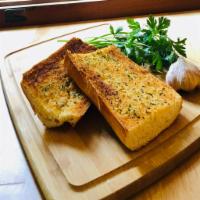 Garlic Bread · Bordenave's Bakery Sourdough bread spread with our tasty Garlic butter