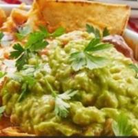 Amigos and Chips · Vegan. 3 pieces amigos. Served with a side of guac, beans, pico de gallo, and chips.