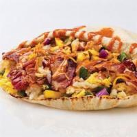 Awakin with Bacon · Bacon, eggs, spinach, cheddar, green peppers. onions, ancho chipotle sauce, salt and pepper.