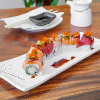 Rainbow Roll · Shrimp tempura, spicy tuna, imitation crab meat, and avocado topped with unagi and unagi sau...