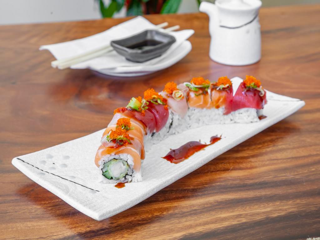 Rainbow Roll · Shrimp tempura, spicy tuna, imitation crab meat, and avocado topped with unagi and unagi sauce.