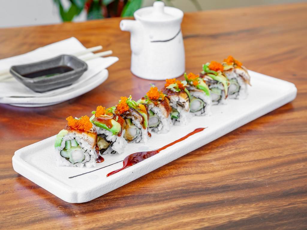 Dragon Roll · Shrimp tempura and cucumber topped with unagi and avocado.