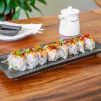 Super Lion Roll · Imitation crab, fried shrimp top with bluefin tuna, special sauce, and fried onion.