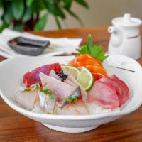 Chirashi Don · Assorted fish over sushi rice with shredded nori and green onions.