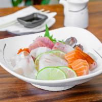 Premium Chirashi Don · Assorted special fish over sushi rice with shredded nori and green onions.