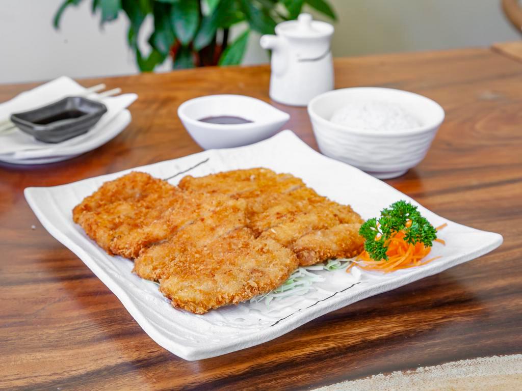 Chicken Katsu · Breaded and deep-fried chicken cutlet with katsu dipping sauce.