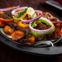 Tandoor Mix Grill Platter · A house specialty. This adventurous combination platter allows you to sample our tandoori ch...