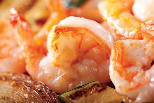 Hibachi Shrimp · Hibachi shrimp grilled with onions, scallions and yellow peppers in a spicy homemade sauce.