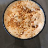 Winter Latte, 12oz hot / 16oz iced · Steamed Coconut Milk, Espresso, topped with house-made Almond Croquant