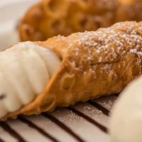 Chocolate Chip Cannoli · Crispy shells stuffed to order with a sweet, cannoli cream filling mixed with chocolate chip...