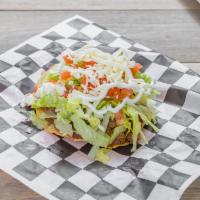 Tostadas · Made with hard flat tortilla served with Red refried beans, lettuce, sour cream, cheese, tom...