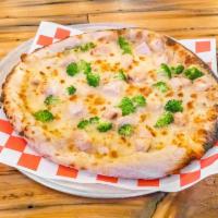 Sister Carol's Pizza · Alfredo, breaded chicken, broccoli, garlic, and cheese blend. All pizzas 14