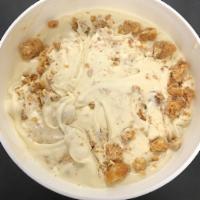 Bourbon Brittle  · Bourbon infused ice cream with a pecan brittle. (Gluten-free).