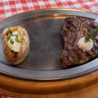T-Bone · BOLD, BEEFY NEW YORK STRIP ON ONE SIDE AND A TASTE OF MILD, TENDER FILET MIGNON ON THE OTHER...