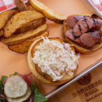 Smoked Polish Sausage Sandwich · WITH APPLE COLESLAW AND ORIGINAL BBQ SAUCE ON A TOASTED BUN. INCLUDES FRESH-CUT FRIES, SUB A...
